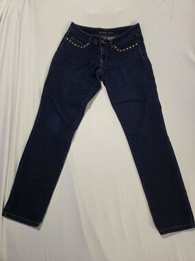 Stylish dark wash jeans by Michael Kors featuring gold stud detailing along the